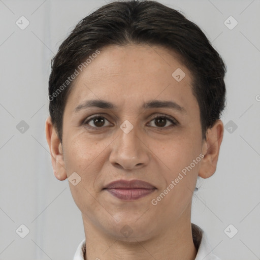 Joyful white adult female with short  brown hair and brown eyes