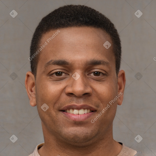 Joyful latino young-adult male with short  brown hair and brown eyes