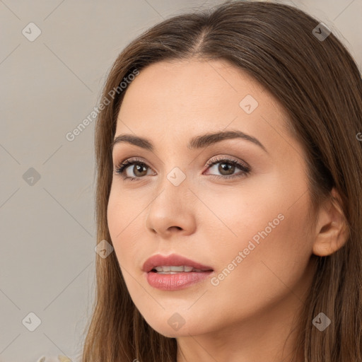 Neutral white young-adult female with long  brown hair and brown eyes