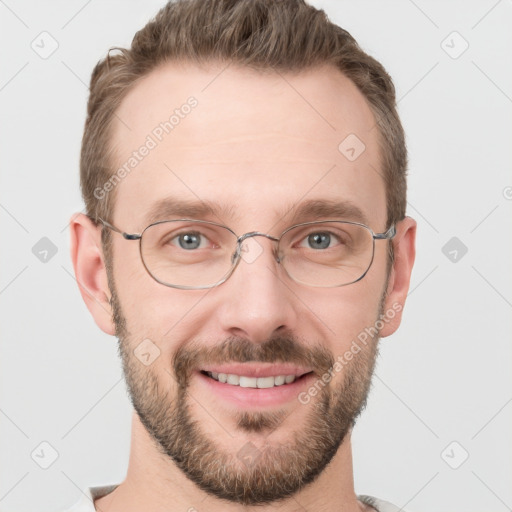 Joyful white adult male with short  brown hair and grey eyes