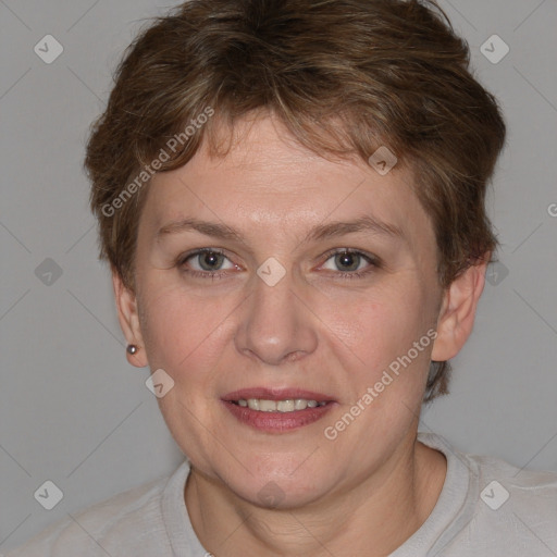 Joyful white adult female with short  brown hair and brown eyes