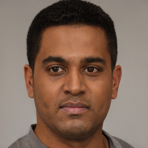 Neutral black young-adult male with short  brown hair and brown eyes