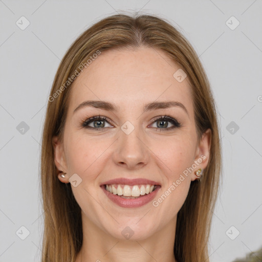 Joyful white young-adult female with long  brown hair and grey eyes