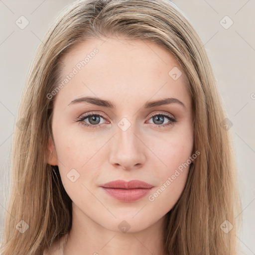 Joyful white young-adult female with long  brown hair and green eyes