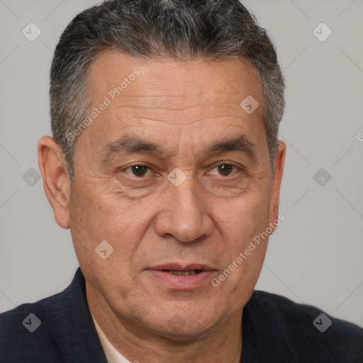 Joyful white middle-aged male with short  brown hair and brown eyes