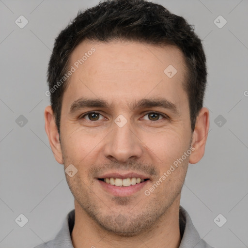 Joyful white young-adult male with short  brown hair and brown eyes