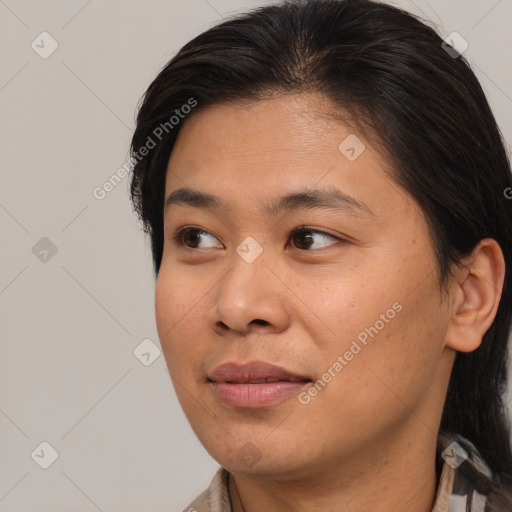 Joyful asian young-adult female with medium  brown hair and brown eyes