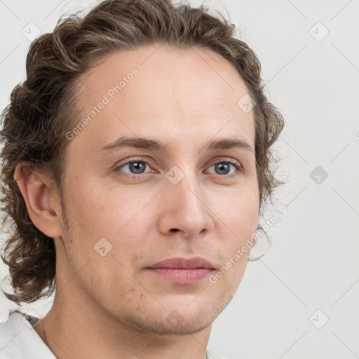 Neutral white young-adult male with short  brown hair and grey eyes