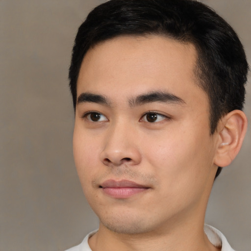 Neutral white young-adult male with short  black hair and brown eyes
