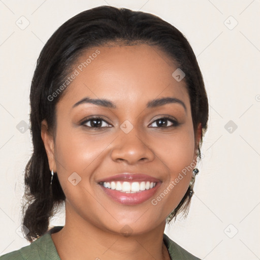 Joyful latino young-adult female with medium  brown hair and brown eyes