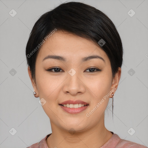 Joyful asian young-adult female with short  black hair and brown eyes