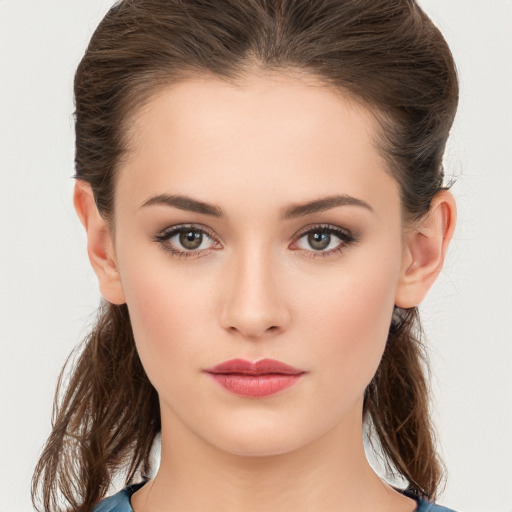 Neutral white young-adult female with medium  brown hair and brown eyes