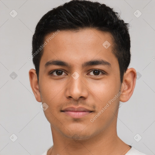 Neutral latino young-adult male with short  black hair and brown eyes