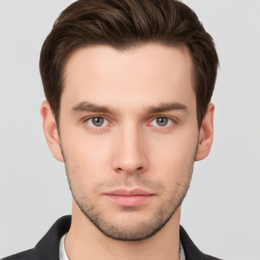 Neutral white young-adult male with short  brown hair and brown eyes