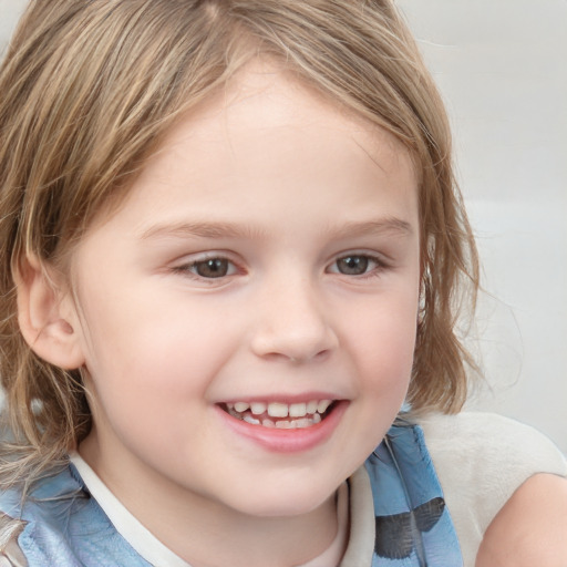 Joyful white child female with medium  brown hair and grey eyes