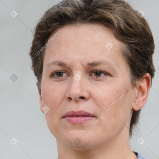 Joyful white adult female with short  brown hair and brown eyes