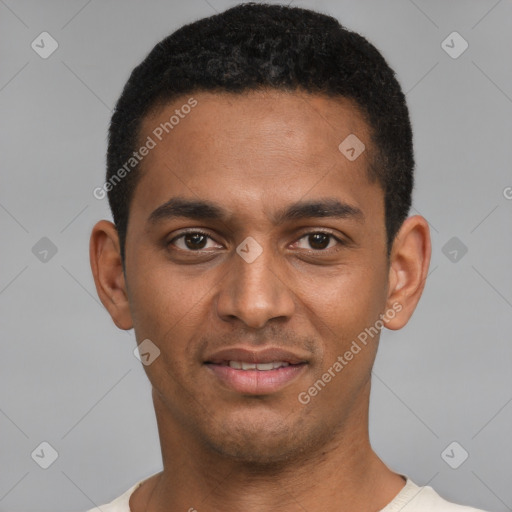 Joyful black young-adult male with short  black hair and brown eyes