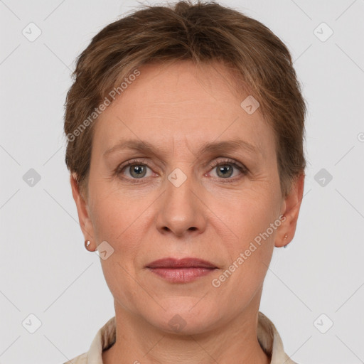 Joyful white adult female with short  brown hair and grey eyes