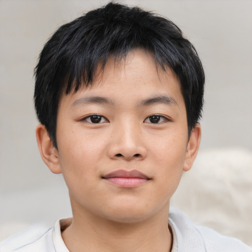 Neutral asian child male with short  brown hair and brown eyes