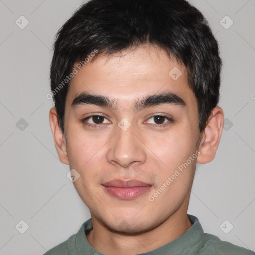 Joyful white young-adult male with short  black hair and brown eyes