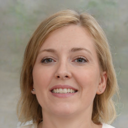 Joyful white young-adult female with medium  brown hair and blue eyes