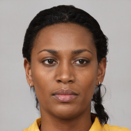 Neutral black young-adult female with medium  black hair and brown eyes