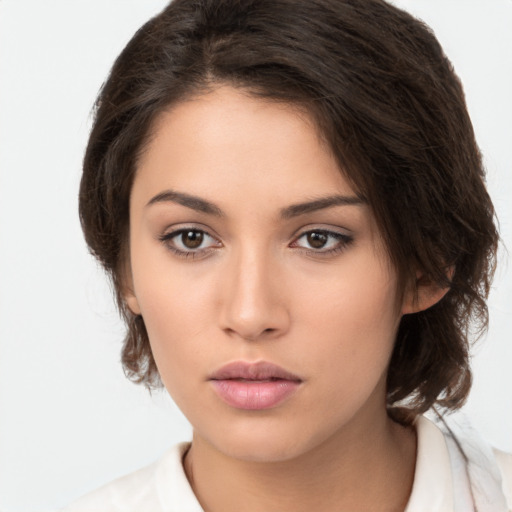 Neutral white young-adult female with medium  brown hair and brown eyes