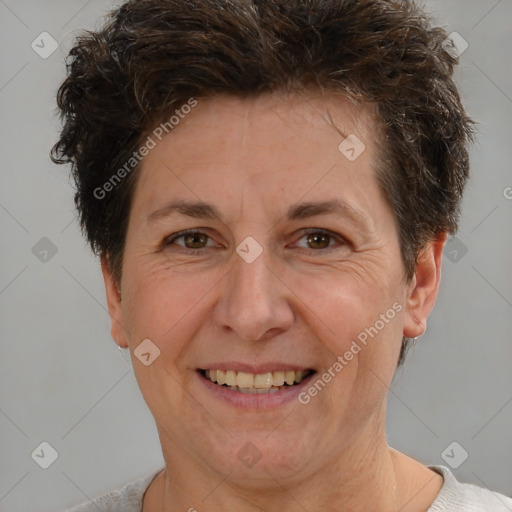 Joyful white adult female with short  brown hair and brown eyes