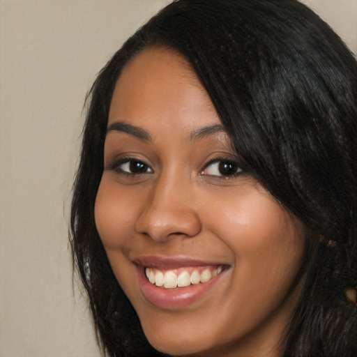 Joyful latino young-adult female with long  black hair and brown eyes