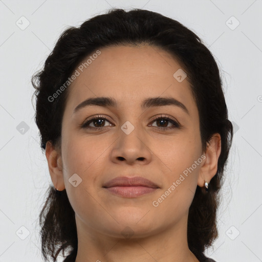 Joyful latino young-adult female with medium  brown hair and brown eyes