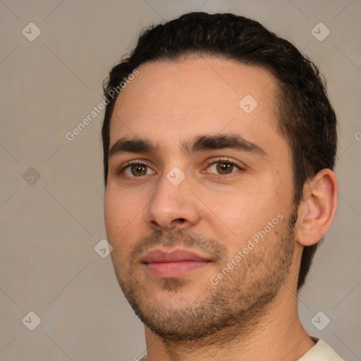 Joyful white young-adult male with short  black hair and brown eyes