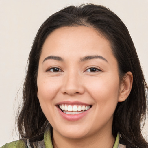 Joyful white young-adult female with medium  brown hair and brown eyes