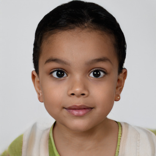 Joyful latino child female with short  brown hair and brown eyes