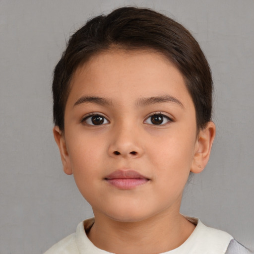 Neutral white child female with short  brown hair and brown eyes