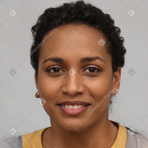 Joyful black young-adult female with short  black hair and brown eyes