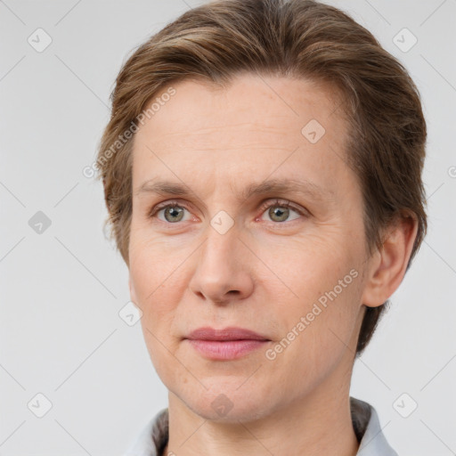 Joyful white adult male with short  brown hair and grey eyes