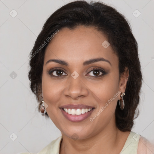 Joyful latino young-adult female with long  brown hair and brown eyes