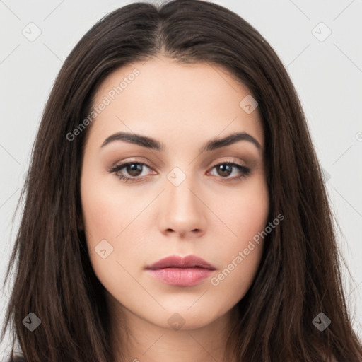 Neutral white young-adult female with long  brown hair and brown eyes