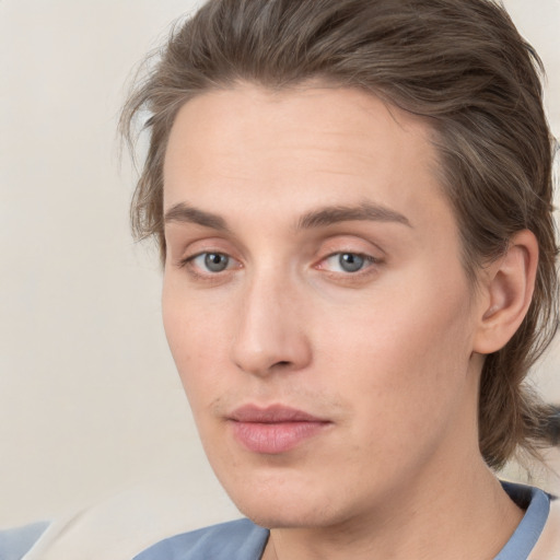 Neutral white young-adult male with medium  brown hair and brown eyes