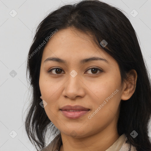 Joyful latino young-adult female with medium  brown hair and brown eyes