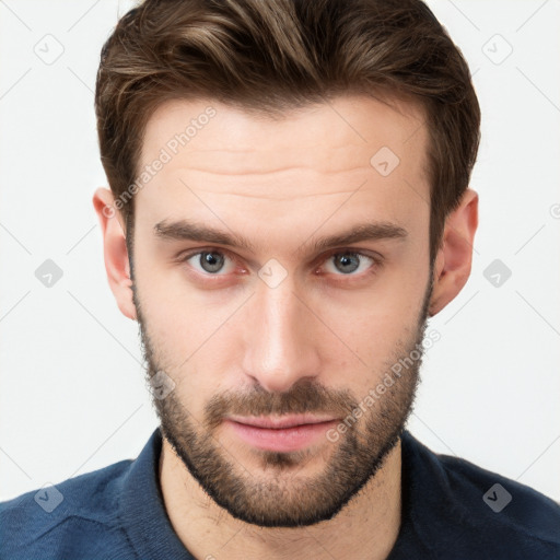 Neutral white young-adult male with short  brown hair and grey eyes