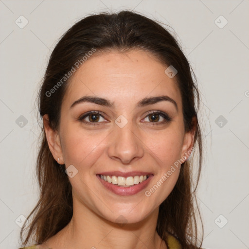 Joyful white young-adult female with long  brown hair and brown eyes