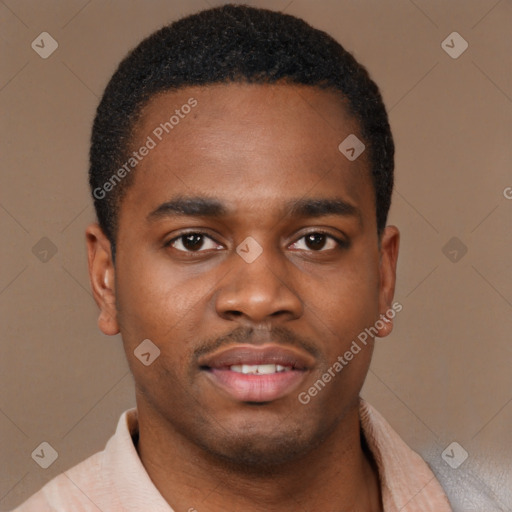 Joyful latino young-adult male with short  brown hair and brown eyes