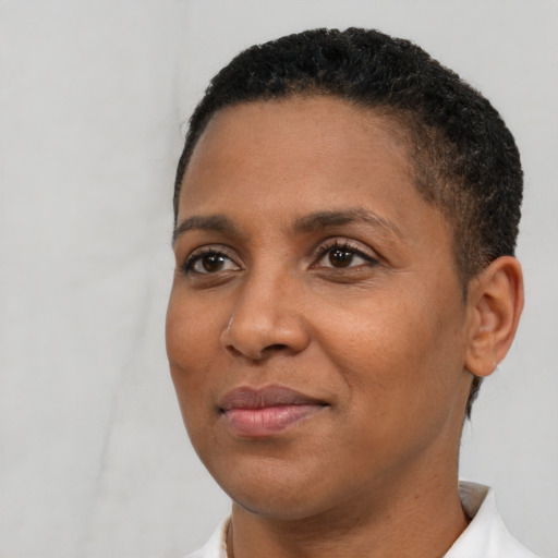 Neutral latino adult female with short  brown hair and brown eyes