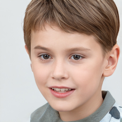 Joyful white child female with short  brown hair and grey eyes