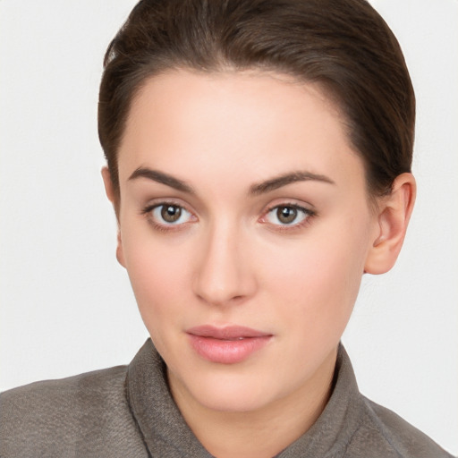 Neutral white young-adult female with short  brown hair and brown eyes