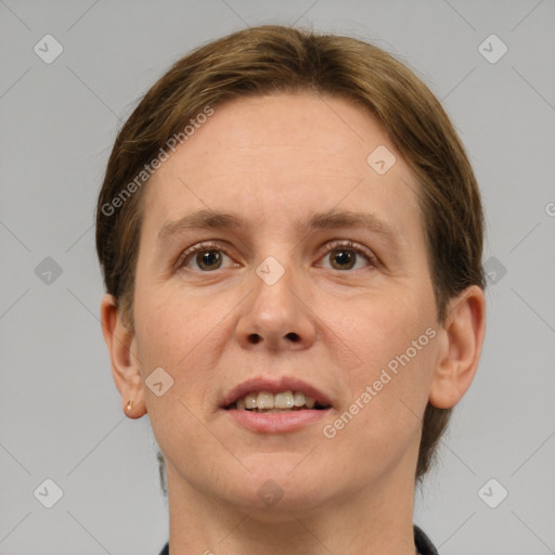 Joyful white young-adult female with short  brown hair and grey eyes