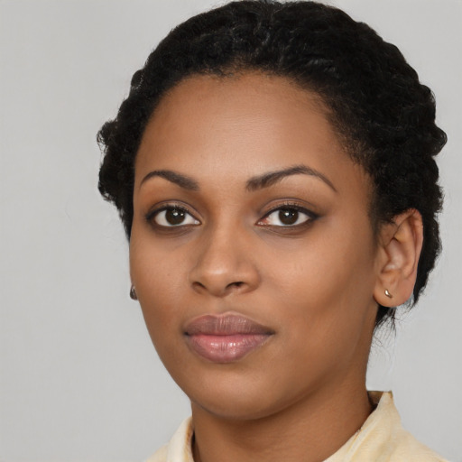 Neutral black young-adult female with short  black hair and brown eyes
