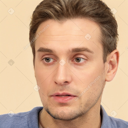 Neutral white young-adult male with short  brown hair and brown eyes