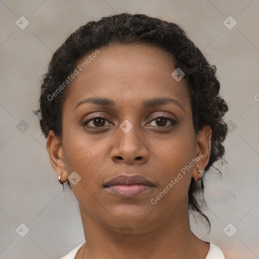 Neutral black young-adult female with short  brown hair and brown eyes